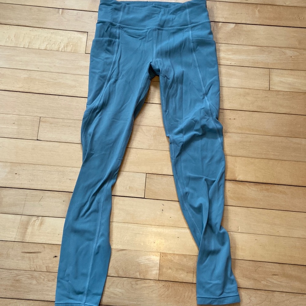 Athleta girl tights in green, size 8-10.  Great condition.